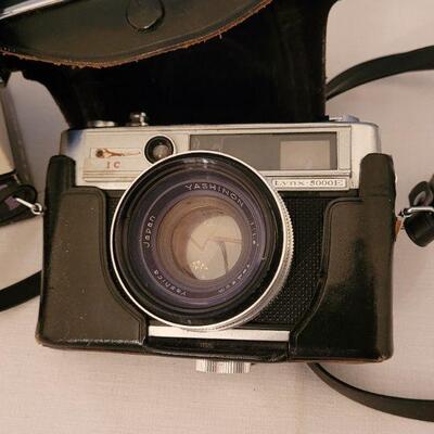 Lot 153: Vintage Yashica 35mm Camera with Box and Case