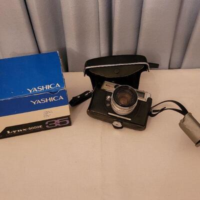 Lot 153: Vintage Yashica 35mm Camera with Box and Case