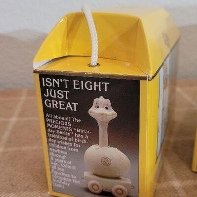 Lot 158: Assorted NEW PRECIOUS MOMENTS Birthday Collectibles