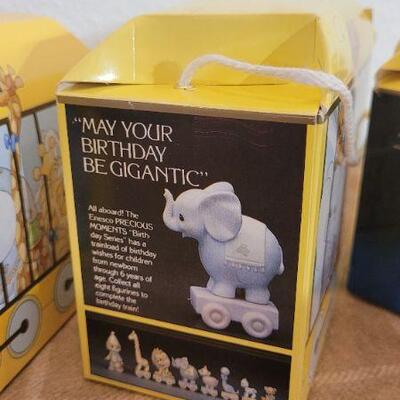 Lot 158: Assorted NEW PRECIOUS MOMENTS Birthday Collectibles