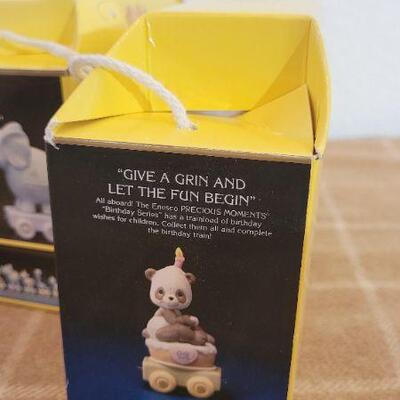Lot 158: Assorted NEW PRECIOUS MOMENTS Birthday Collectibles