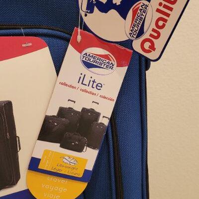 Lot 173: New iLite AMERICAN TOURISTER 29" Expandable Upright Luggage