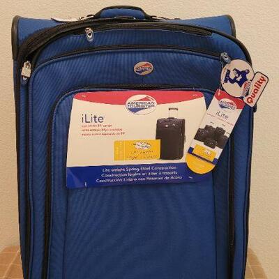 Lot 173: New iLite AMERICAN TOURISTER 29" Expandable Upright Luggage