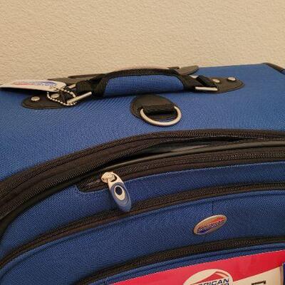 Lot 173: New iLite AMERICAN TOURISTER 29" Expandable Upright Luggage