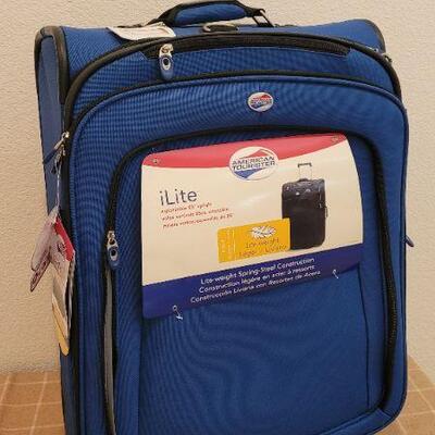 Lot 183: New iLite 25" Upright Expandable Luggage