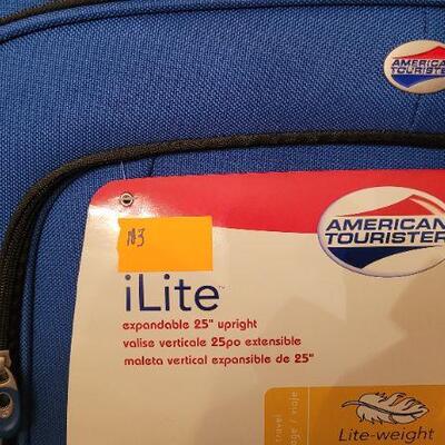 Lot 183: New iLite 25" Upright Expandable Luggage