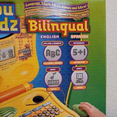 Lot 246: New COMPUKIDZ Bilingual MATH MUSIC GAMES and MORE!