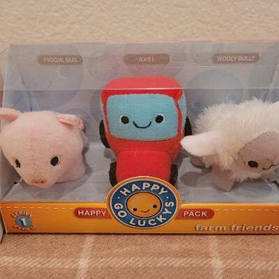 Lot 266: (3) New HAPPY GO LUCKYS Collectibles 