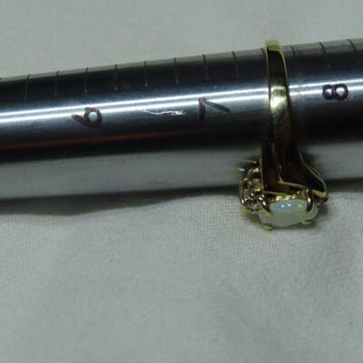 10k diamond and Opalescent ring
