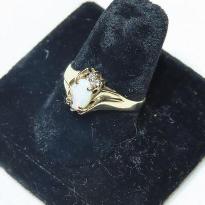 10k diamond and Opalescent ring