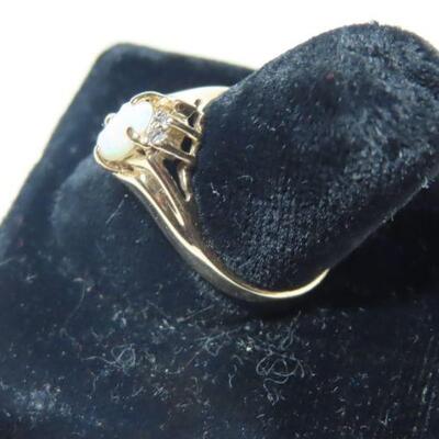 10k diamond and Opalescent ring
