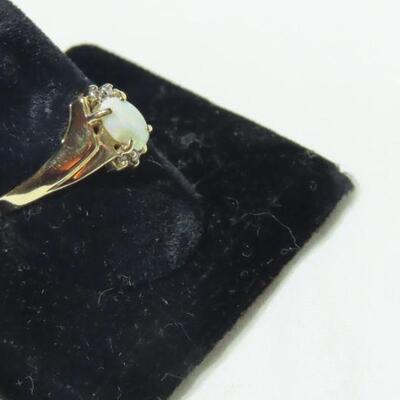 10k diamond and Opalescent ring