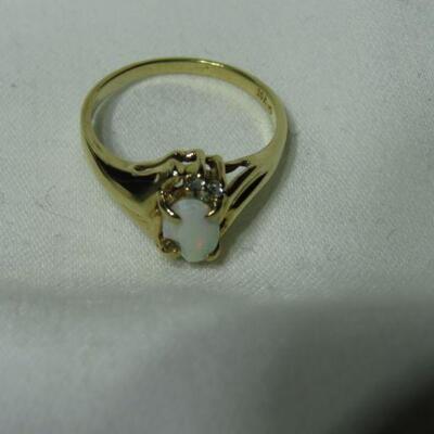 10k diamond and Opalescent ring