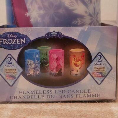 Lot 38: (2) New Disney FROZEN Flameless Color Changing Candles 