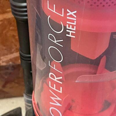 G10: Bissel Black and Pink Vacuum Cleaner
