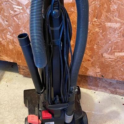G10: Bissel Black and Pink Vacuum Cleaner