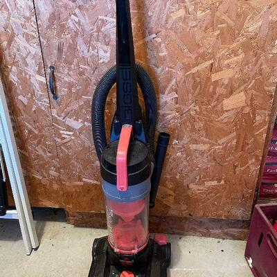 G10: Bissel Black and Pink Vacuum Cleaner
