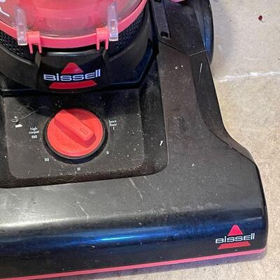 G10: Bissel Black and Pink Vacuum Cleaner