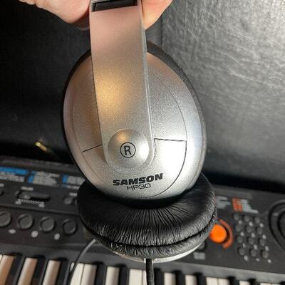 G25: Casio SA-76 Electronic Keyboard and Samson HP30 Headphones