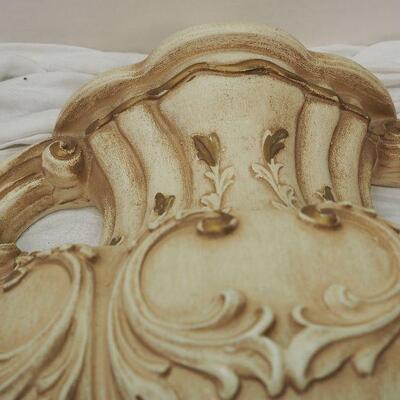 Lot 13 Plaster Faux wall fountain hangs on wall