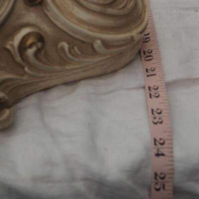 Lot 13 Plaster Faux wall fountain hangs on wall