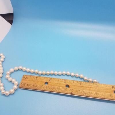 Lot #12 - Ivory Pearl Necklace and Earring Set