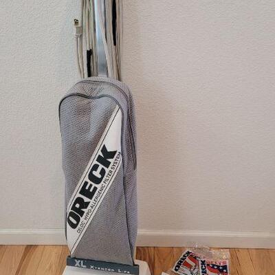 Lot 82: Vintage ORECK XL Vacuum Cleaner w/ Accessory Belts + Manual TESTED A+
