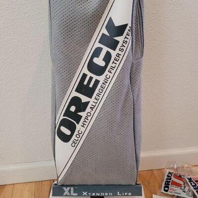 Lot 82: Vintage ORECK XL Vacuum Cleaner w/ Accessory Belts + Manual TESTED A+