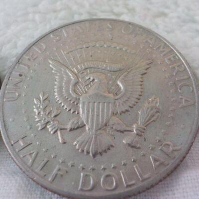 3- coins 1979 Susan B, 2000  Sacagawea dollar, Kennedy 1981 half.