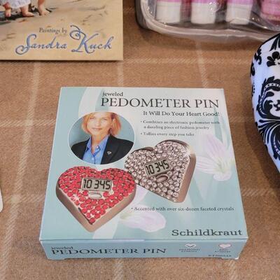 Lot 175: Bath Set, Make up Bag, Coffee Cup Book and Heart Pedometer 