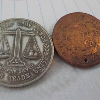Jesse Helms 1/2 troy ounce silver and Liberty coin.