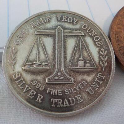 Jesse Helms 1/2 troy ounce silver and Liberty coin.