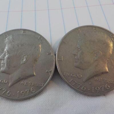 2- Kennedy Centenneial Half dollars.