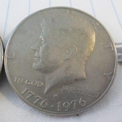 2- Kennedy Centenneial Half dollars.