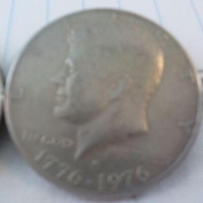 2- Kennedy Centenneial Half dollars.