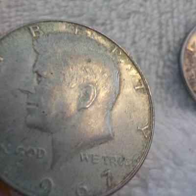 2 - 1962 and 1964 Kennedy silver half dollars.