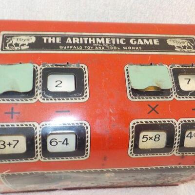 Buffalos and Toy tin Bank Adding machine.