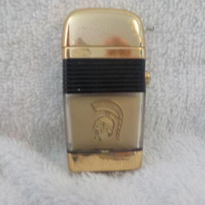 Scripto vu-lighter with gold trim.