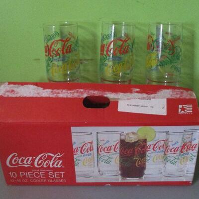 Lot 72 - 10 piece set of Coca-Cola Colorful Collage Glasses GOOGLE ALERT
