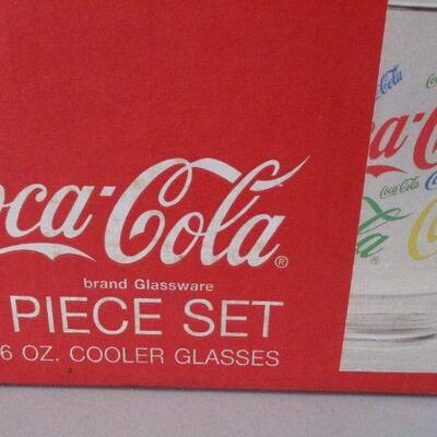 Lot 72 - 10 piece set of Coca-Cola Colorful Collage Glasses GOOGLE ALERT