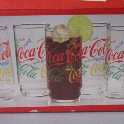 Lot 72 - 10 piece set of Coca-Cola Colorful Collage Glasses GOOGLE ALERT
