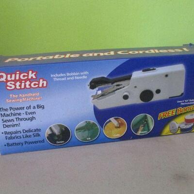 Lot 87 - Quick Stitch Handheld Sewing Machine