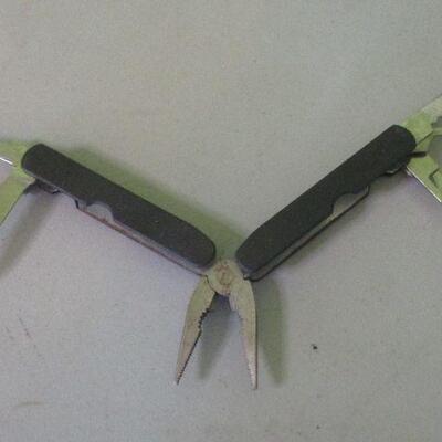 Lot 123 - Multi-purpose Tool