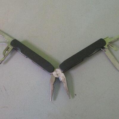 Lot 123 - Multi-purpose Tool