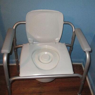 Lot 145 - Toilet Chair and 2 Canes LOCAL PICKUP ONLY