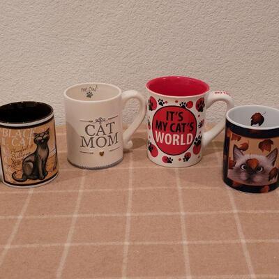 Lot 239: Kitty Coffee Cup Lot
