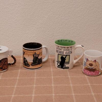 Lot 240: Kitty Coffee Cup Lot - One with Lid