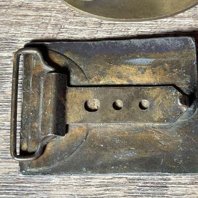 G76: Pair of Metal Belt Buckles