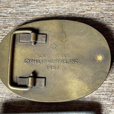 G76: Pair of Metal Belt Buckles