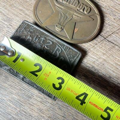 G76: Pair of Metal Belt Buckles